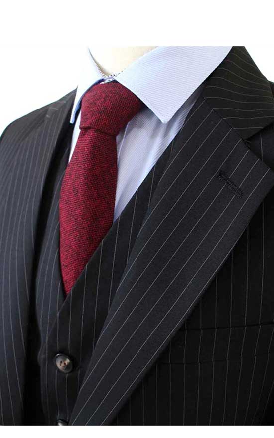 Groom's Dark Gray Three-Piece Suit with Red Tie